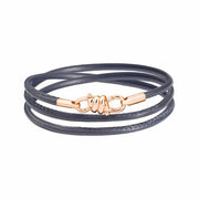 Bracciale Nodo Dodo in oro rosa 9K con cinturino in pelle grigia, simbolo di unione e amicizia.